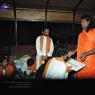 01-SWAMI-DISTRIBUTING-NEW-CLOTHES-TO-ASHRAMITES